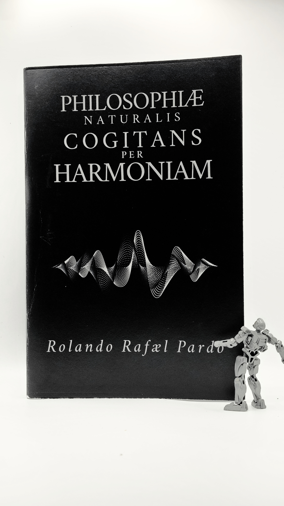 52-page lyric book by Austin singer-songwriter Rolando Rafael Pardo with lyrics, stories, and biographies — cover inspired by Isaac Newton’s Principia Mathematica.