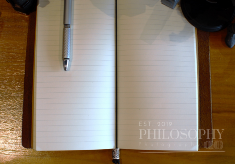 Odyssey Notebook – custom leather travel journal in brown and black with Nordic rune designs and Thor’s Hammer motif